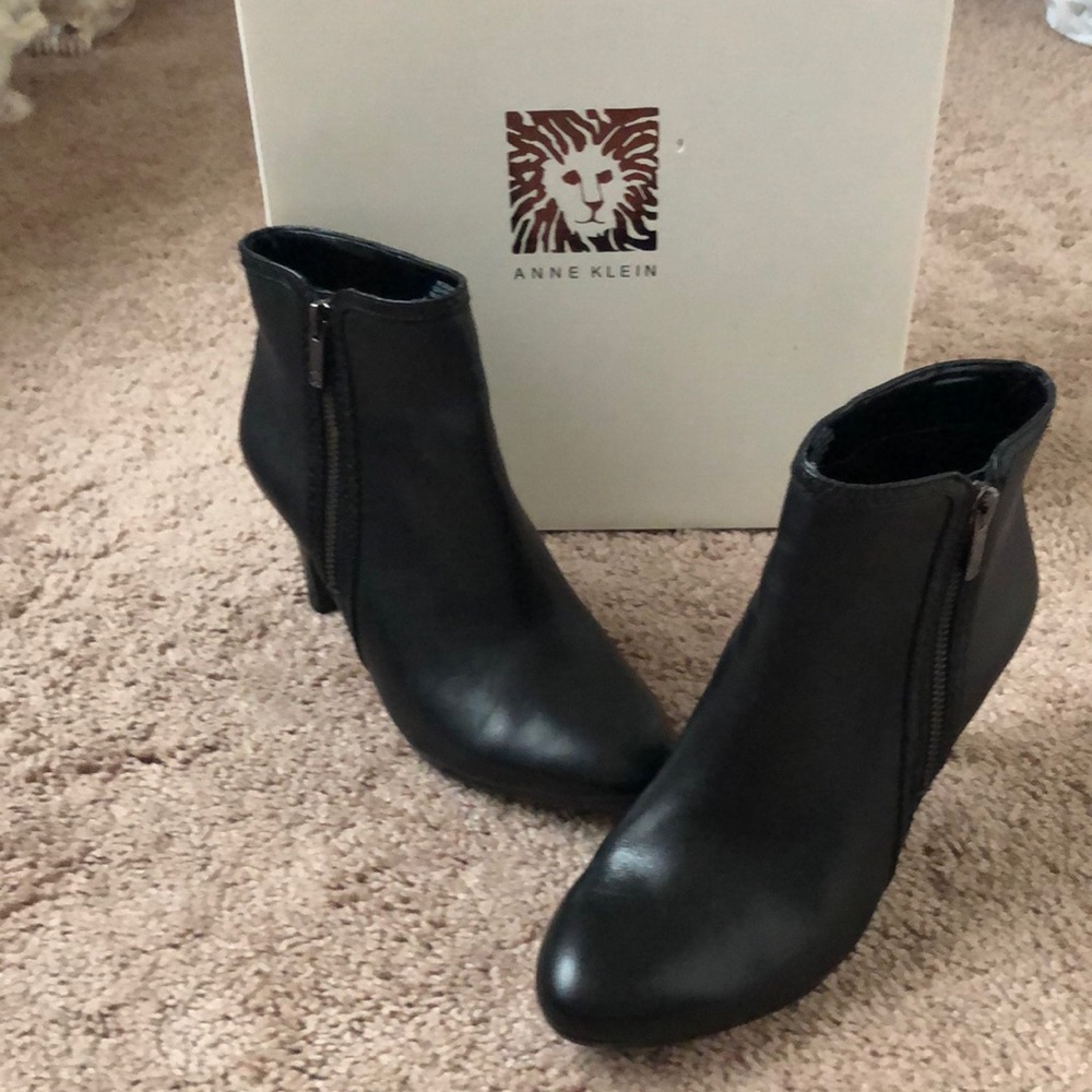 Sleek black ankle boots with 3 inch heel